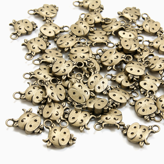 [기본부자재] 청동 지퍼장식(지퍼텍) 카우 (50개)