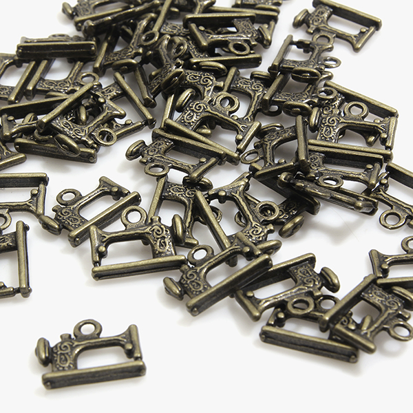 [기본부자재] 청동 지퍼장식(지퍼텍) 재봉틀 (50개)